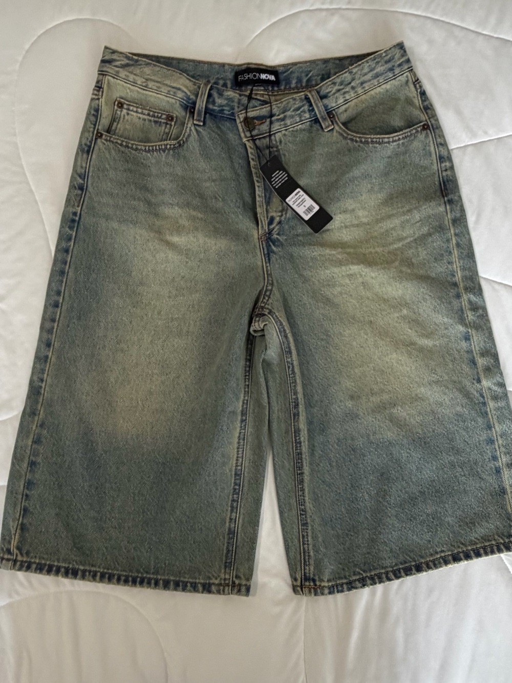 Fashion Nova woman Faded Light Blue Denim Shorts